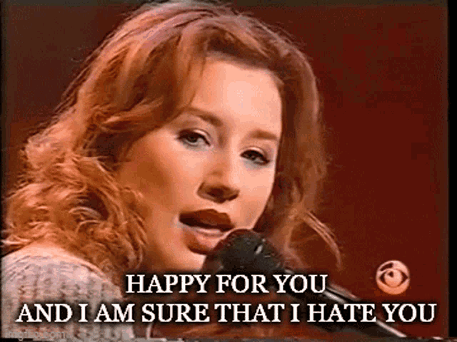 a woman singing into a microphone with the words " happy for you and i am sure that i hate you "