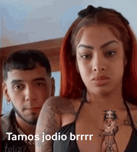 a man and a woman are standing next to each other with the words tamos jodio brrr written on the bottom of the image
