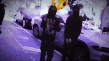 a man wearing a hoodie that says ' i am a ninja ' on it