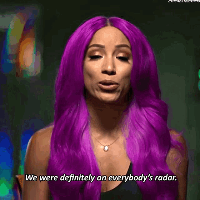a woman with purple hair is talking about everybody 's radar