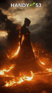 a woman in a dress is surrounded by flames and the words handy 53 above her