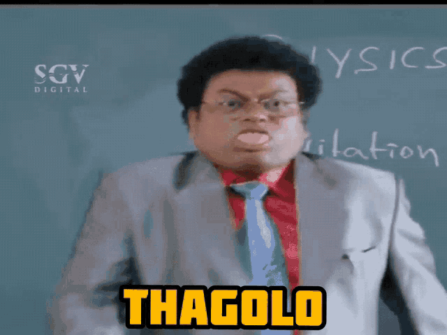 a man stands in front of a row of empty classroom chairs and says thagolo