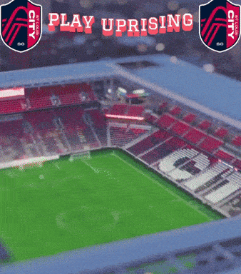 a soccer stadium with the words play uprising on the top