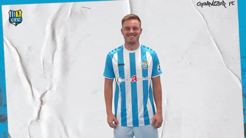 a man in a blue and white striped shirt with jako on the front