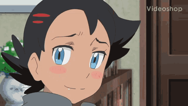 a close up of a cartoon character with a videoshop logo in the corner