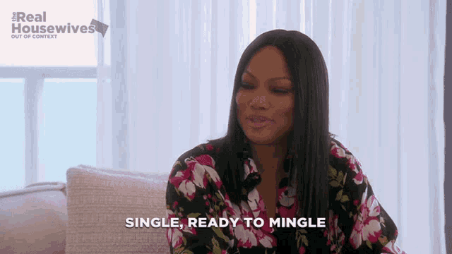 a woman is sitting on a couch with the words single ready to mingle