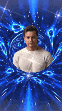 a man in a white sweater is standing in a blue tunnel of light