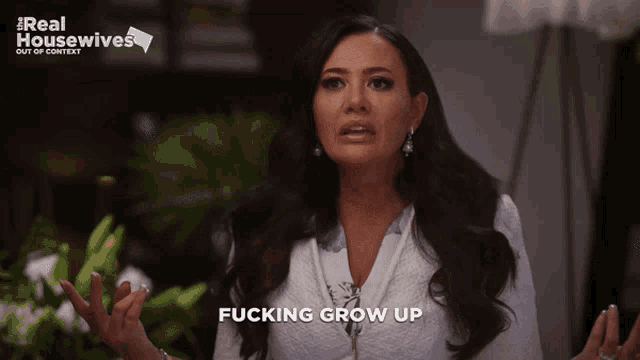 a woman says fucking grow up in front of a real housewives poster