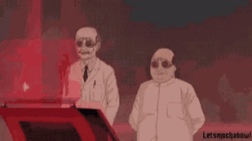 three men are standing next to each other in a dark room .