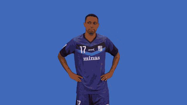 a man wearing a purple minas jersey with his hands on his hips