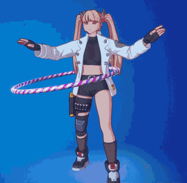 a girl is holding a hula hoop in her hands