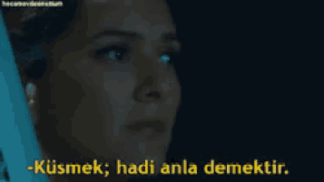 a close up of a woman 's face with a caption that says - kusmek
