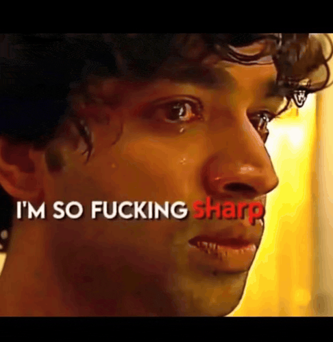 a man is crying with the words i 'm so fucking sharp above him