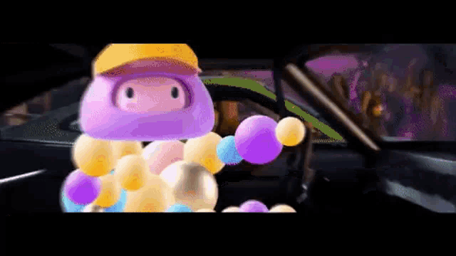 a cartoon character wearing a yellow hat is holding balloons in a car