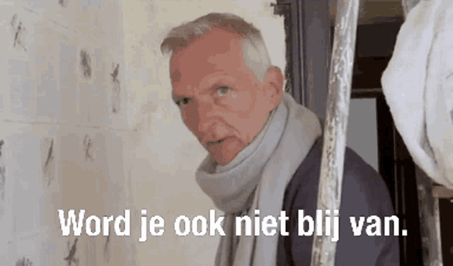 a man with a scarf around his neck and the words word je ook niet blij van written below him