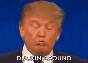 donald trump is making a funny face with his eyes closed and the words ducking around above him .