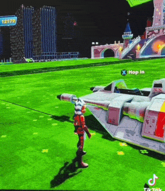 a video game screen shows a character standing next to a plane that says " hop in " on it