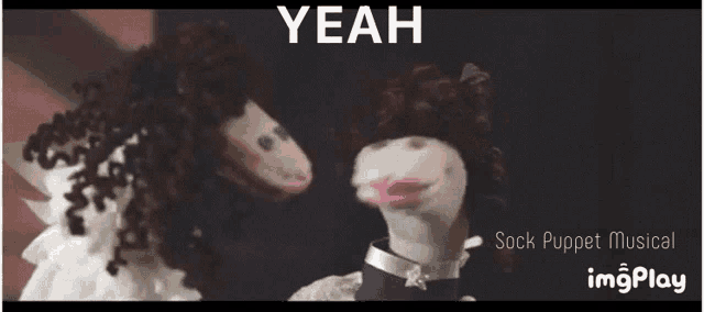 two socks puppet dolls are standing next to each other with the words yeah behind them