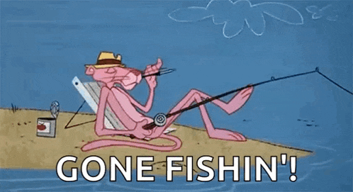 pink panther is sitting in a chair on the beach holding a fishing rod .