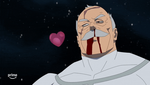 a man with a bloody nose is holding a pink heart in his hand and the word prime is on the bottom