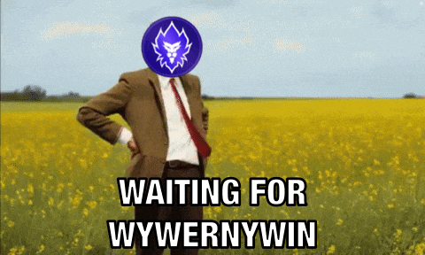 a man in a suit and tie is standing in a field of yellow flowers with the words waiting for wywernywin on the bottom