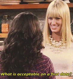 two women are standing next to each other and one of them is asking the other what is acceptable on a first date