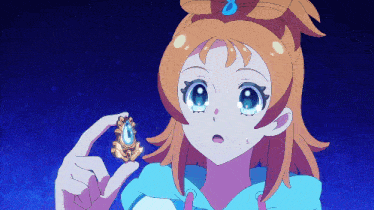 a girl with a blue bow in her hair is holding a pendant in her hand