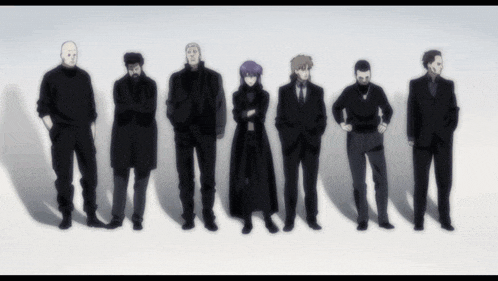 a group of people are standing in a row with their arms crossed