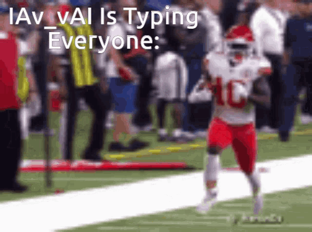 a football player with the number 10 on his jersey is running on a field