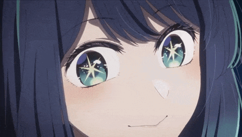 a close up of a girl with blue hair and blue eyes