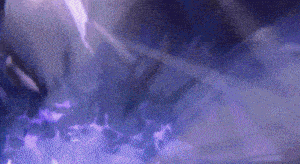 a purple background with a lot of smoke and a purple light coming out of it .