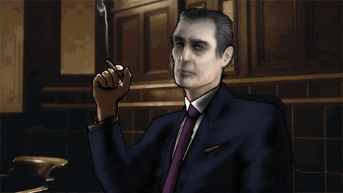 a man in a suit and tie smoking a cigar in a dark room