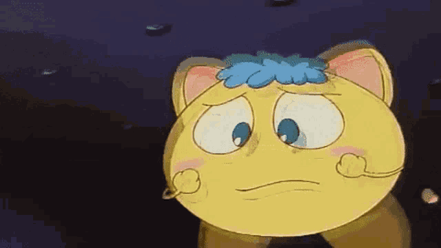 a cartoon character with a cat 's ears and a blue flower on his head .