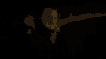 a man in a dark room with the word oh glowing in the background