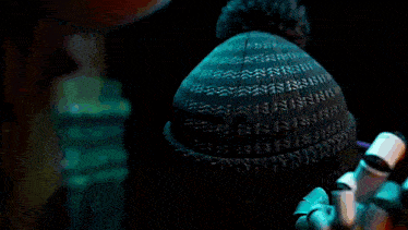 a drawing of a person wearing a knitted hat with a blue background