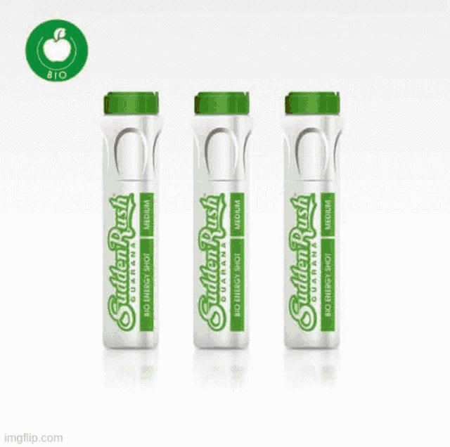 three bottles of sudden rush are sitting on a wooden stump