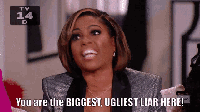 a woman says " you are the biggest ugliest liar here " on a tv screen