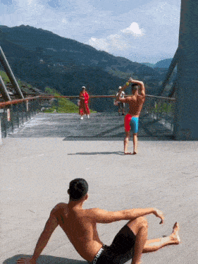 a shirtless man in a pair of under armour shorts