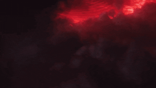 a red background with a lot of bubbles and smoke