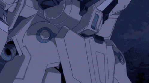 a robot is flying through the air with a blue light coming out of it 's mouth .