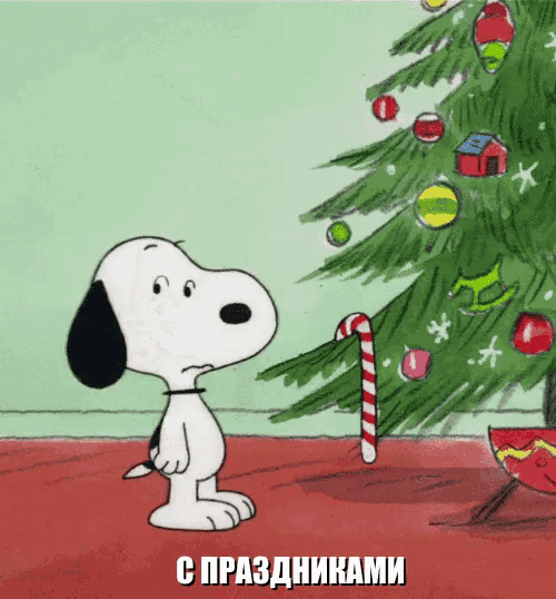 a cartoon of snoopy standing next to a christmas tree with a candy cane