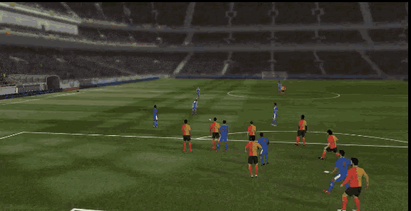 a group of soccer players are playing on a field with a goalie in the net .