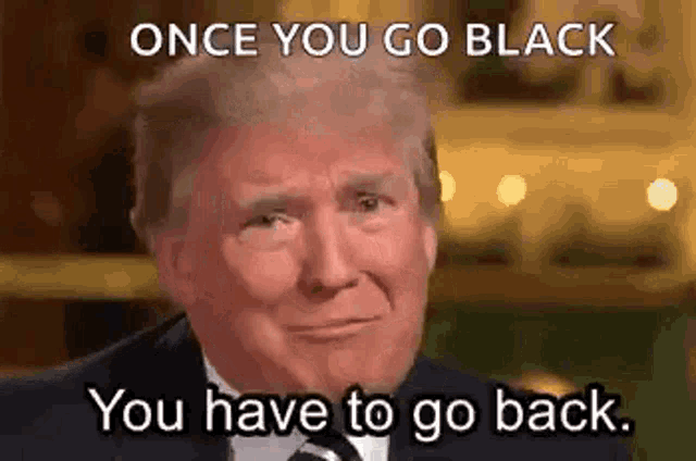 a close up of a man in a suit and tie with the words `` once you go black , you have to go back . ''