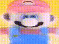 a close up of a toy mario wearing a pink hat and blue overalls .