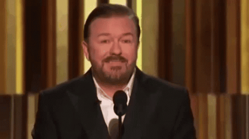 Shut Up Stop Laughing GIF - Shut Up Stop Laughing Ricky Gervais GIFs