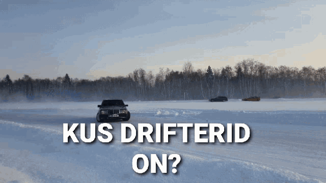 a bmw is drifting in the snow with the words kus drifterid on