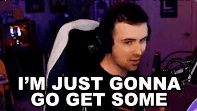 a man wearing headphones is sitting in a gaming chair and saying `` i 'm just gonna go get some ''
