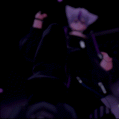 a pixelated image of a person in a purple outfit