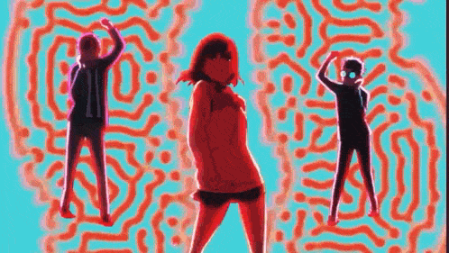 a group of people are standing in front of a maze .