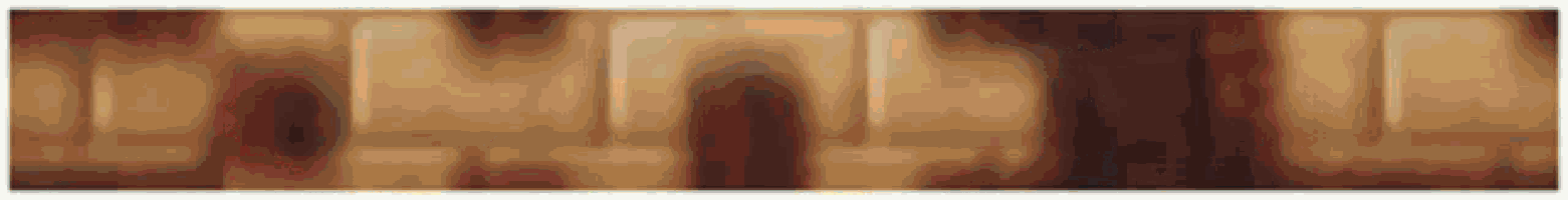 a close up of a wooden surface with a blurred background
